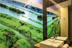 Fotografía del baño de la habitación triple